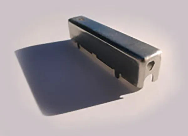 STAMPED BRASS COVER FOR THE COPIER INDUSTRY