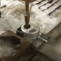 Waterjet holes in steel caps