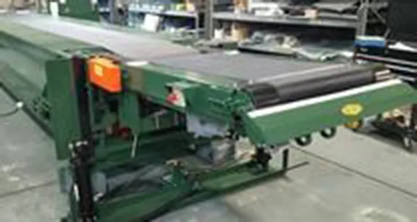 ADJUSTOVEYOR WITH FRONT END STACKER