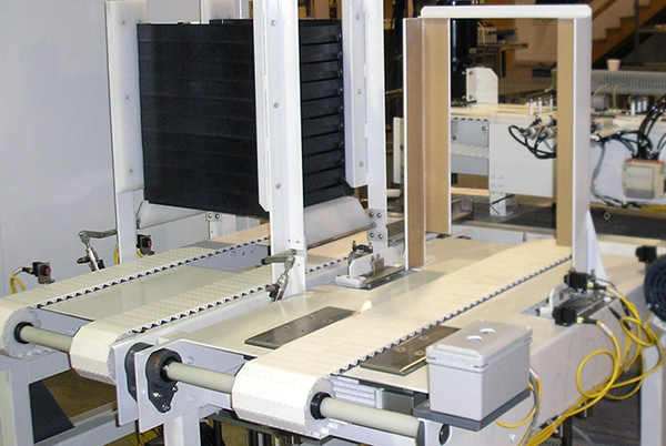 Automated systems tray stackers
